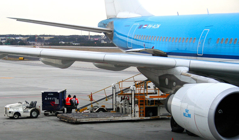 Missy loaded to the airplane